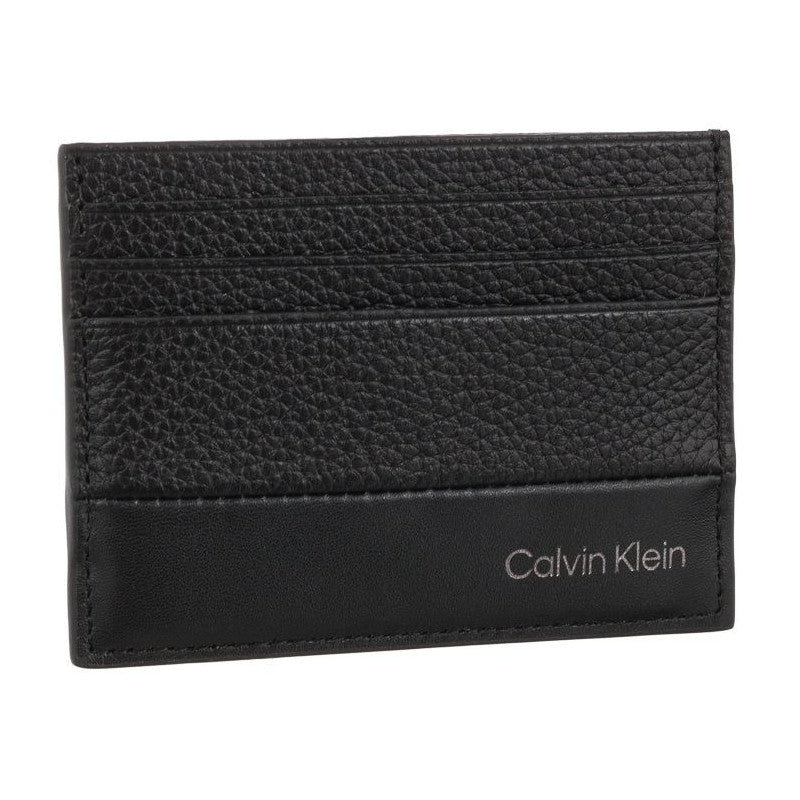 Calvin Klein crni muški novčanik s horizontalnim prugama
